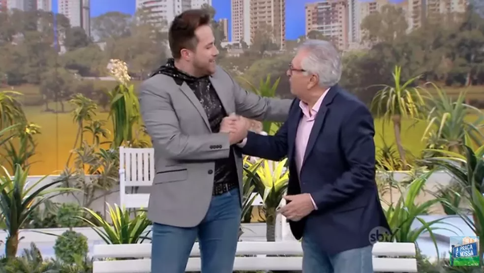 Kleber Lopes e o humorista Carlos Alberto de Nóbrega, no programa